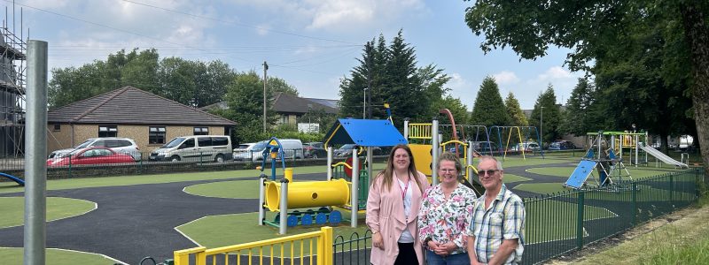 Councillor and colleagues at Mercer Park, with play area in background